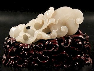 CARVED WHITE JADE RUYI ON STAND
