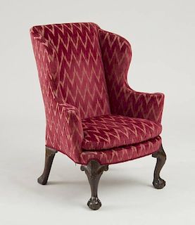 EARLY GEORGE III CARVED MAHOGANY WING ARMCHAIR