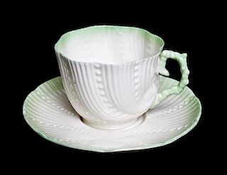 A Belleek Blarney Teacup and Saucer, Diameter of Saucer 5 1/4 inches.