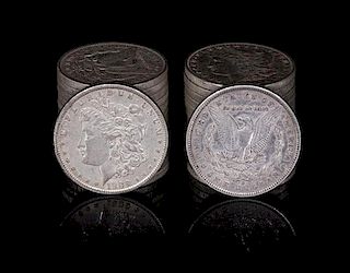 A Group of Twenty-Eight United States 1900-O Morgan Silver Dollar Coins