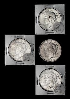 A Group of Four United States 1923 Peace Dollar Coins