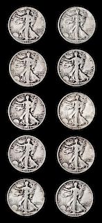 * A Collection of Twenty-Eight United States Walking Liberty 50c Coins