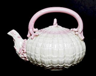 A Belleek Tridacna Teapot, Length over handle 8 inches.
