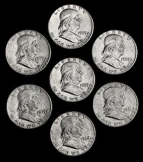 * A Collection of Seven United States Benjamin Franklin 50C Coins