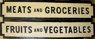 Two wooden country store signs