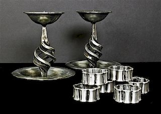 A Pair of Pewter Candlesticks, Height of candlestick 6 inches.