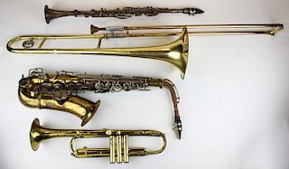 four Brass instruments as found 