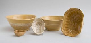 TWO FAUN-GLAZED POTTERY MIXING BOWLS AND THREE JELLY MOLDS