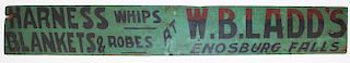 W.B.Ladd's wooden trade sign