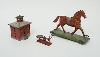 AMERICAN RED-PAINTED CAST-IRON STILL BANK, TWO-PIECE CAST-IRON MODEL OF A STORE SCALE AND A PAINTED TIN TROTTING HORSE PULL TOY