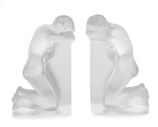 A Pair of Lalique Bookends Height 8 3/4 inches.