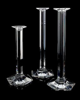 Three Baccarat Candlestick Holders Height of tallest 17 3/4 inches.