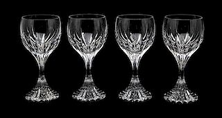 A Set of Twelve Baccarat Wine Glasses Height 7 inches.