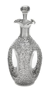 A Silver Overlay Glass Decanter Height 10 1/2 inches.