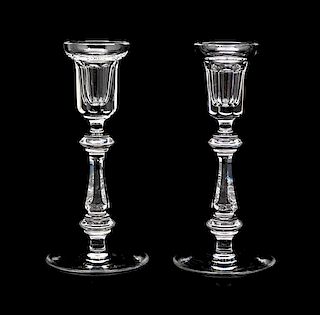 A Pair of Waterford Candlesticks Height 8 1/4 inches.
