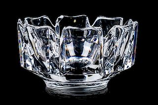 An Orrefors Glass Bowl Height 4 x diameter 7 1/4 inches.