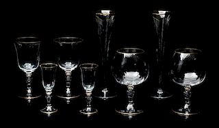 Italian Murano Fifty-Seven Piece Stemware Set With Gilt Rims Height of tallest glass 9 3/4 inches.