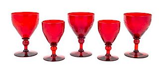 Five Steuben Selenium Red Glasses in the Grape Pattern Height of tallest 5 1/8 inches.