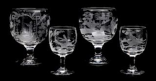 A Set of Etched Glass Stemware Height of tallest 8 inches.