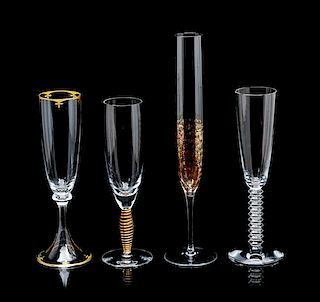 Four Pairs of Toasting Flutes Height of tallest pair 12 1/4 inches.