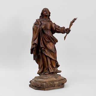 Spanish Baroque Carved Wood Figure of a Martyr Holding Palm Frond