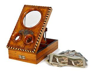 A Walnut Stereoscopic Viewer, Adjustable height approximately 10 1/2 inches.