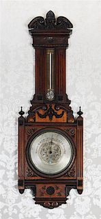 A Victorian Various Woods Thermometer and Barometer, Height 37 x width 12 inches.
