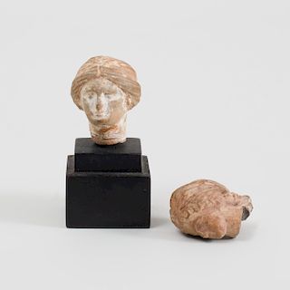 Two Boeotian Terracotta Heads of Aphrodite