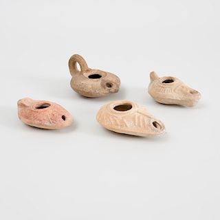 Four Ancient Pottery Oil Lamps