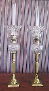 A Pair of Victorian Brass and Cut Glass Oil Lamps, Height 23 1/2 inches.
