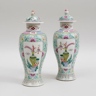 Pair of Chinese Mint Green Ground Famille Rose Porcelain Slender Baluster Jars and Covers