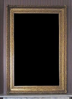 A Victorian Giltwood Mirror, Height 78 x width 53 inches.