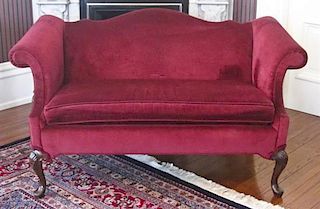 An Upholstered Camelback Settee, Height 33 x width 59 x depth 28 1/2 inches.