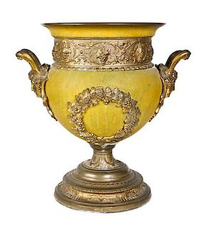 A Neoclassical Brass Urn, Height 12 3/4 x width over handles 12 inches.