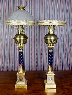 A Pair of Porcelain Table Lamps, Height with shade 34 inches.