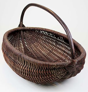 large early 20th c. buttocks style basket