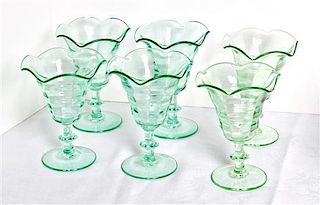 Six Green Glass Sundae Cups, Height 5 1/2 inches.