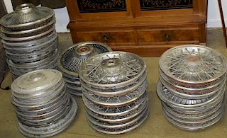 collection of 126 vintage automobile hubcaps