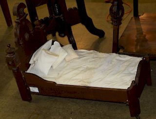 Victorian black walnut high back doll's bed