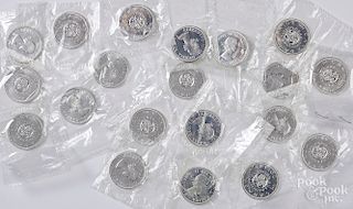 Twenty 1964 Canada silver dollars.