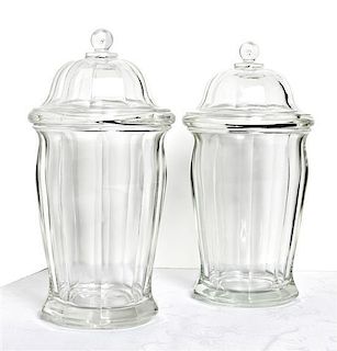 A Pair of Lidded Apothecary Jars, Height 11 1/2 inches.