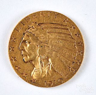 1910 Indian head five dollar gold coin.