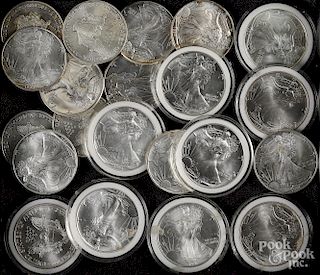 Twenty-one American eagle 1 ozt. fine silver coin