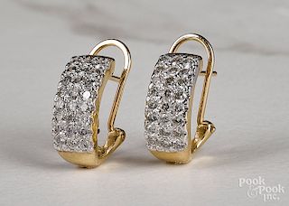 Pair of 14K yellow gold diamond earrings