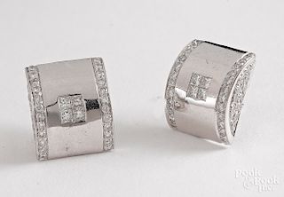 Pair of 18K white gold and diamond earrings.