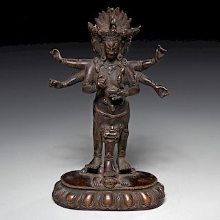 Tibetan standing three-legged deity