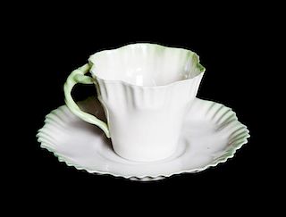 A Belleek Demitasse Cup and Saucer, Diameter of saucer 4 1/2 inches.