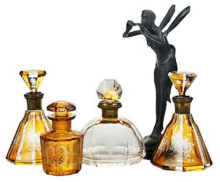 Four Amber Glass Perfumes and Fairy Bronze