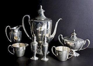 A Silver-Plate Seven-Piece Coffee Service, Height of teapot 11 inches.