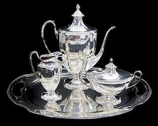 A Silver-Plate Three-Piece Coffee Service, Height of teapot 11 inches.